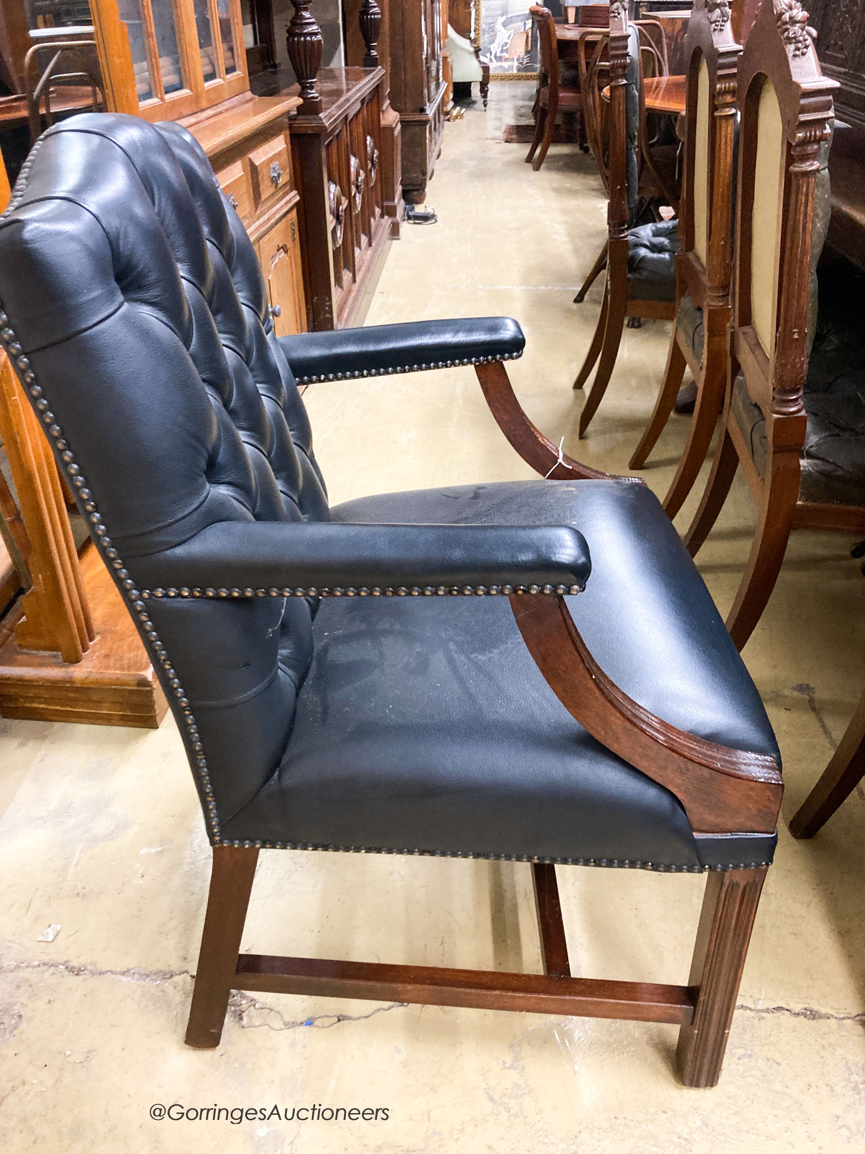 A set of four reproduction beech Gainsborough type elbow chairs, width 60cm, depth 60cm, height 98cm